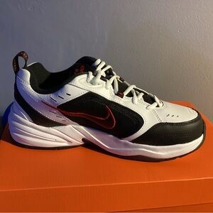 Nike Air Monarch IV Black and White Sneakers with Red Swoosh